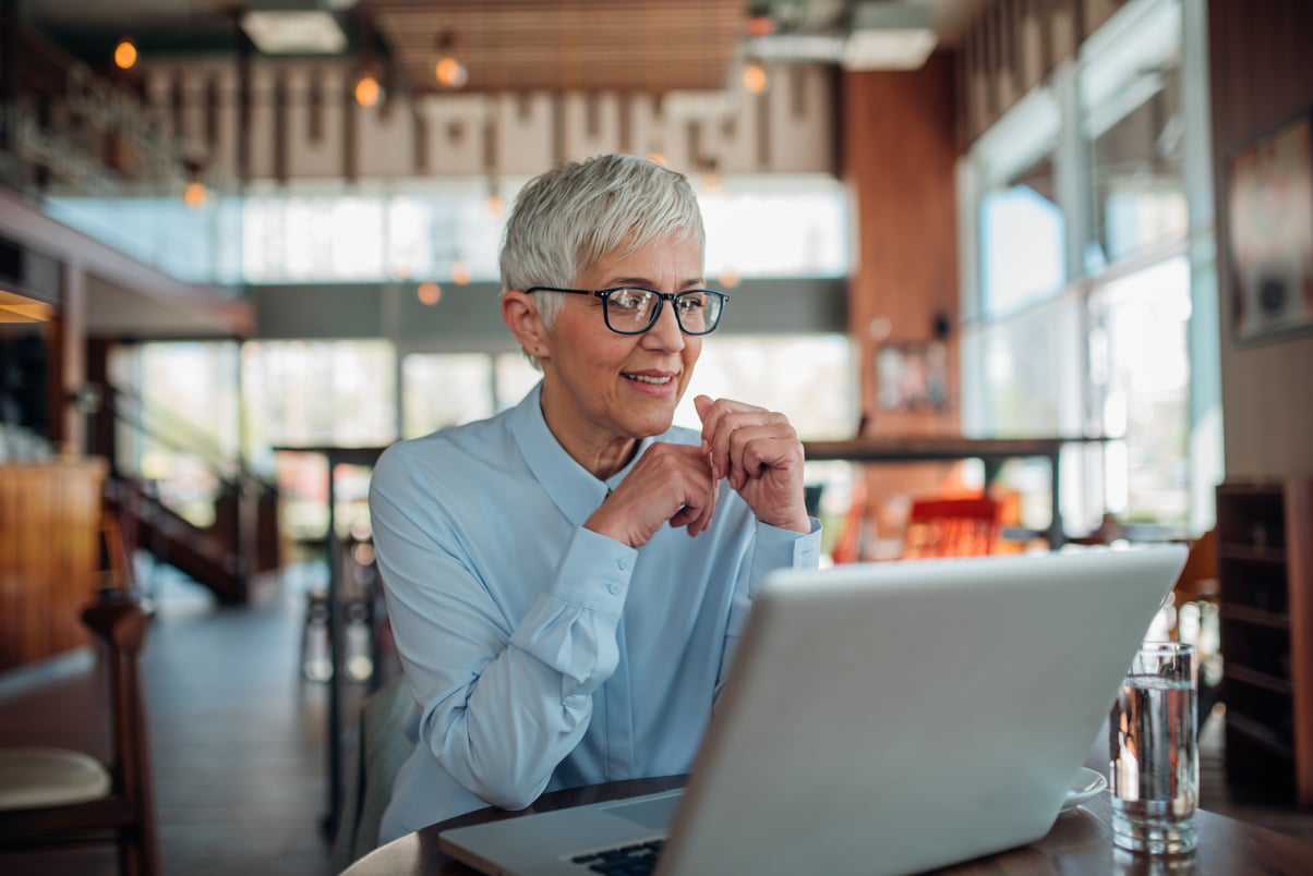 Older woman using laptop