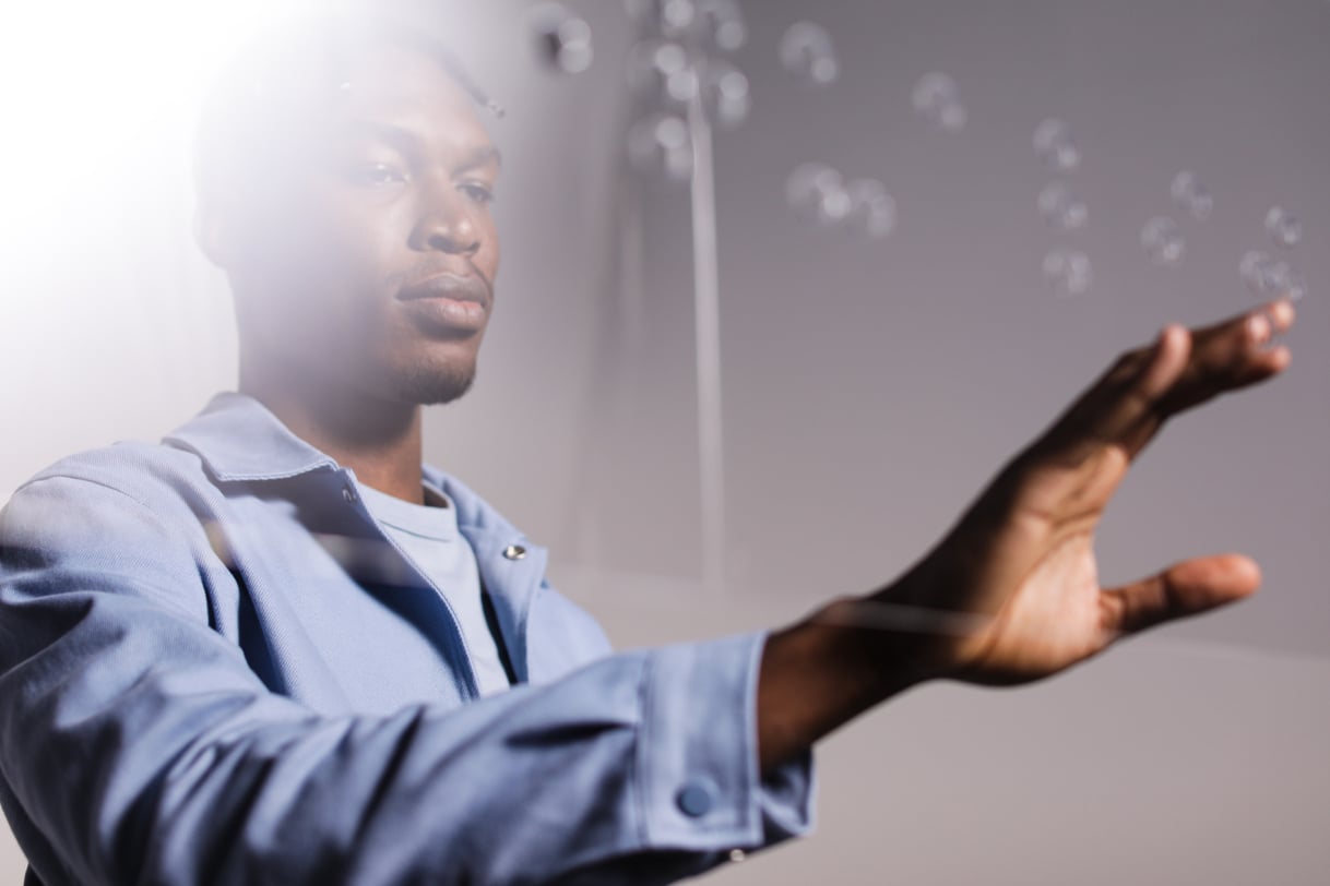 A Man Touching a Braille